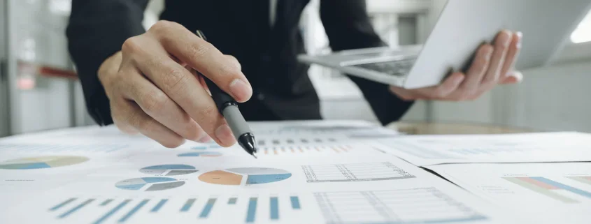 Businessman analyse investment marketing data.